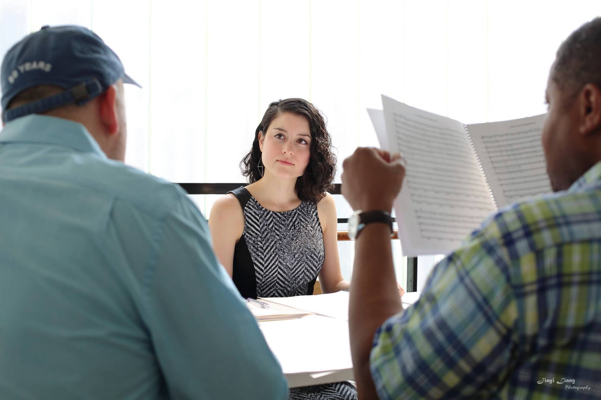 Hilary Purrington receives feedback from Underwood mentor composers Derek Bermel and Trevor Weston. 