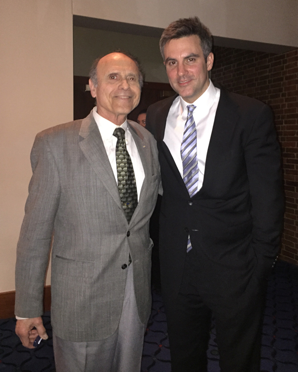 Samuel Adler and Kevin Puts, both wearing a jacket and tie, standing next to each other.